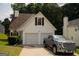 Charming home with a two-car garage and well-manicured lawn at 3269 N Winds N Trl, Douglasville, GA 30135