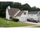 Charming home with a two-car garage and well-manicured lawn at 3269 N Winds N Trl, Douglasville, GA 30135
