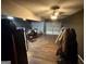 Spacious two car garage with wood flooring, motorcycle and a ceiling fan at 3269 N Winds N Trl, Douglasville, GA 30135