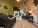 Inviting living room with a fireplace, comfortable seating, and a ceiling fan at 3269 N Winds N Trl, Douglasville, GA 30135