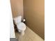 Powder room with toilet and tile floors at 3269 N Winds N Trl, Douglasville, GA 30135