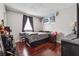 Charming bedroom with hardwood floors and natural light from the window at 5022 Audubon Pl, Norcross, GA 30093