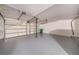Spacious garage with painted floor and doors at 765 Martin Rd, Stone Mountain, GA 30088