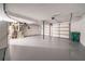 Spacious garage with painted floor and doors at 765 Martin Rd, Stone Mountain, GA 30088