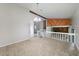 Spacious living room with open floor plan, decorative wood accents, and staircase at 765 Martin Rd, Stone Mountain, GA 30088