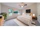 Bright and spacious main bedroom features vaulted ceilings, a comfortable bed, and serene decor at 765 Martin Rd, Stone Mountain, GA 30088