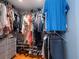 Walk-in closet featuring custom shelving for organization of clothes, shoes, and accessories at 2790 Barnwood Xing, Duluth, GA 30097