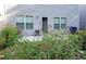 Well-kept backyard with garden, patio and ample space, offers a serene retreat at 3179 Woodward Down Trl, Buford, GA 30519