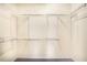 Walk-in closet featuring wire shelving and neutral carpet at 3179 Woodward Down Trl, Buford, GA 30519