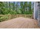 Spacious back deck with natural wood stain and secure railings at 3962 Fairington Dr, Marietta, GA 30066