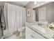 Bright bathroom features granite countertops, white cabinets, and a shower with a curtain at 3962 Fairington Dr, Marietta, GA 30066