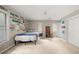 Spacious bedroom decorated with novelty license plates featuring carpeted flooring at 3962 Fairington Dr, Marietta, GA 30066