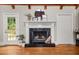 Close-up of fireplace, showcasing marble hearth and white mantel at 3962 Fairington Dr, Marietta, GA 30066
