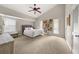 Inviting main bedroom with neutral walls, soft carpet, and vaulted ceiling at 3962 Fairington Dr, Marietta, GA 30066