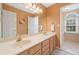Bathroom featuring double sinks and a view into the shower at 5711 Brynwood Nw Cir, Acworth, GA 30101
