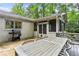 Backyard patio area with built-in grill, ideal for outdoor cooking and enjoyment at 80 Maryeanna Dr, Sandy Springs, GA 30342