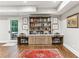 Finished basement features built-in shelves with room for two workstations at 80 Maryeanna Dr, Sandy Springs, GA 30342