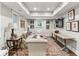 Finished basement featuring a large living area with hardwood floors and recessed lighting at 80 Maryeanna Dr, Sandy Springs, GA 30342