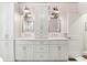 Elegant bathroom with dual vanities, and classic white cabinets at 80 Maryeanna Dr, Sandy Springs, GA 30342