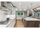 Modern kitchen with stainless steel appliances, a gas range, and ample counter space, perfect for cooking and entertaining at 80 Maryeanna Dr, Sandy Springs, GA 30342