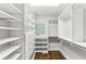 Well-organized walk-in closet maximizes space with custom shelving and hanging rods at 80 Maryeanna Dr, Sandy Springs, GA 30342