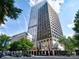 View of office building with trees in front on a sunny day at 20 Marietta Nw St # 13C, Atlanta, GA 30303