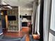 This modern kitchen features sleek black cabinetry and stainless-steel appliances at 20 Marietta Nw St # 13C, Atlanta, GA 30303
