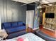 This area features hardwood floors, an open floor plan, and a striking accent wall at 20 Marietta Nw St # 13C, Atlanta, GA 30303