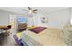Comfortable bedroom featuring a king-size bed, dresser, artwork, and ample closet space at 200 Mcguirts Bridge Rd, Covington, GA 30014
