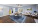 Bright dining area with hardwood floors, a modern ceiling fan, and plenty of natural light at 200 Mcguirts Bridge Rd, Covington, GA 30014