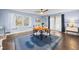 Bright dining area with hardwood floors, and large windows providing lots of natural light at 200 Mcguirts Bridge Rd, Covington, GA 30014