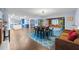 Spacious open-concept area features modern kitchen and seamless flow to dining and living space at 200 Mcguirts Bridge Rd, Covington, GA 30014