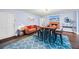 Cozy living room featuring a brick fireplace, modern decor, and a stylish rug defining the seating area at 200 Mcguirts Bridge Rd, Covington, GA 30014