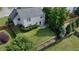 An aerial view capturing the backyard of the home featuring a well maintained lawn, and wood fence at 2163 Berryhill Se Cir, Smyrna, GA 30082