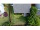 Aerial view of backyard with green lawn, mature trees, wooden fence offering plenty of privacy at 2163 Berryhill Se Cir, Smyrna, GA 30082