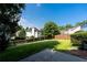 Spacious backyard featuring a well-manicured lawn and a sturdy wood fence at 2163 Berryhill Se Cir, Smyrna, GA 30082