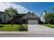 Attractive brick home with a two-car garage, well-maintained lawn, and inviting curb appeal at 2163 Berryhill Se Cir, Smyrna, GA 30082