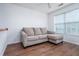 Comfortable living area with a large couch and natural light at 2163 Berryhill Se Cir, Smyrna, GA 30082