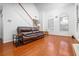 Inviting living room with hardwood floors, large windows, and a cozy seating area at 2163 Berryhill Se Cir, Smyrna, GA 30082