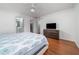 Serene main bedroom with a ceiling fan, walk-in closet and a TV at 2163 Berryhill Se Cir, Smyrna, GA 30082