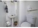 Cozy powder room featuring classic fixtures and neutral decor at 2163 Berryhill Se Cir, Smyrna, GA 30082