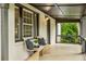 Charming porch with comfortable seating, perfect for enjoying the outdoors at 2201 Plantation Ln, Atlanta, GA 30341