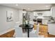 Bright eat-in kitchen features stainless steel appliances and white cabinetry at 2201 Plantation Ln, Atlanta, GA 30341