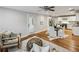 Open concept living room and eat-in kitchen area offers hardwood floors and natural light at 2201 Plantation Ln, Atlanta, GA 30341