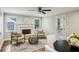 Bright living room with fireplace, hardwood floors, and comfortable seating at 2201 Plantation Ln, Atlanta, GA 30341