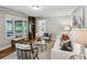 Cozy living room with neutral colors, a ceiling fan, and comfortable seating at 2201 Plantation Ln, Atlanta, GA 30341