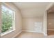 Walk-in closet with a window providing natural light and wire shelving for organization at 2720 Tuscany Park Dr, Lawrenceville, GA 30043