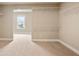Walk-in closet with carpet and wire shelving next to a doorway with access to the adjacent room at 2720 Tuscany Park Dr, Lawrenceville, GA 30043