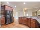 Modern kitchen with stainless steel appliances, hardwood floors, and granite countertops at 2720 Tuscany Park Dr, Lawrenceville, GA 30043