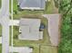Aerial shot of the property displaying its backyard, trampoline, and landscaping features at 3748 Spring Place Ct, Loganville, GA 30052